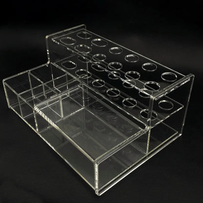 a clear acrylic display case on a black background