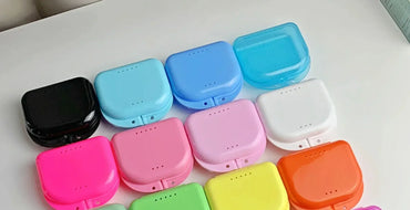 Colorful retainer cases for orthodontic storage, pack of 30, durable plastic, secure for retainers and mouth guards.